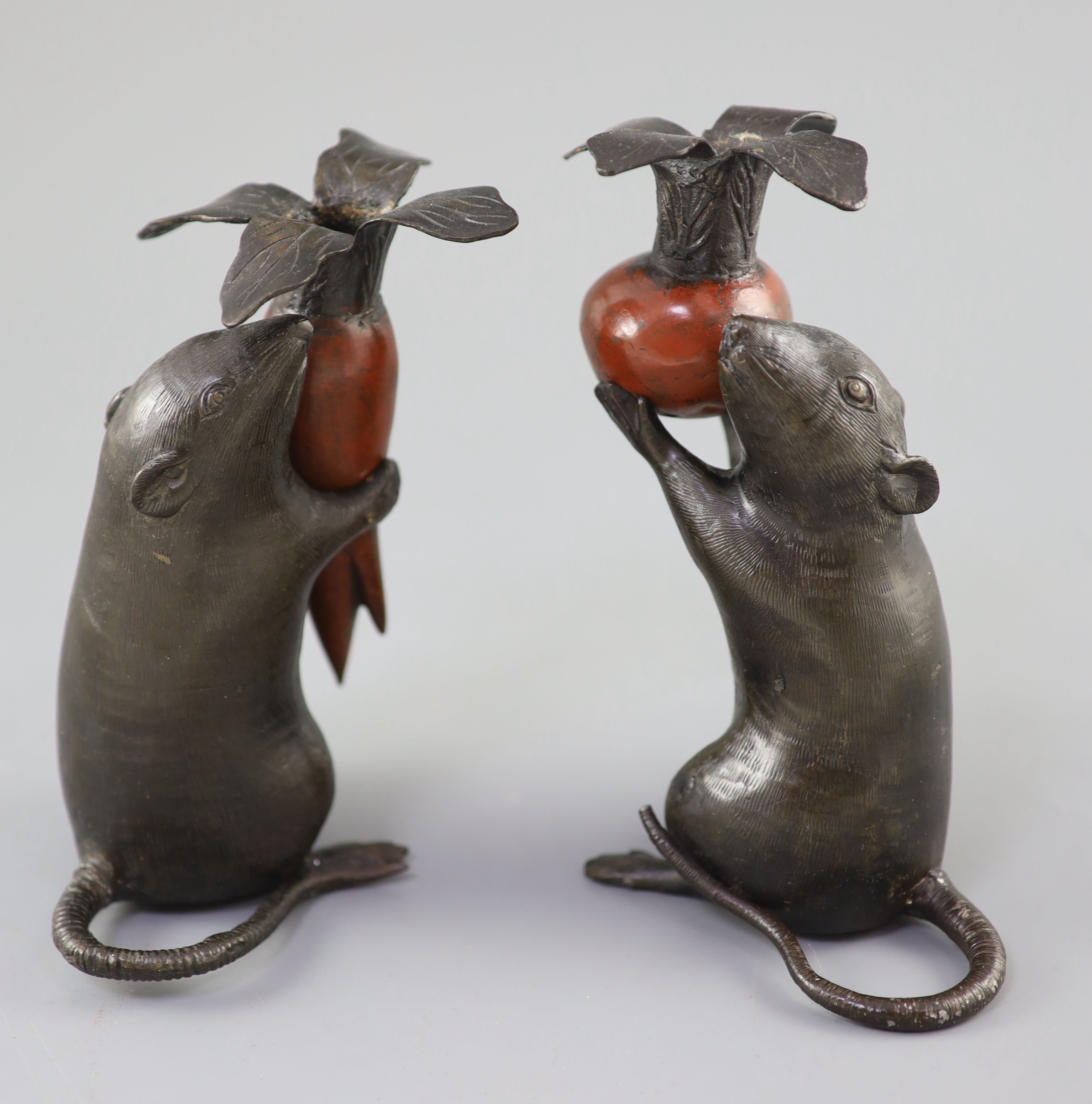 A pair of Japanese bronze rat candlesticks, Meiji period, 16cm and 17cm high